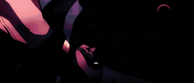 a close up of a person 's hands holding a microphone