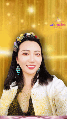 a woman with a flower crown on her head and a starmaker logo