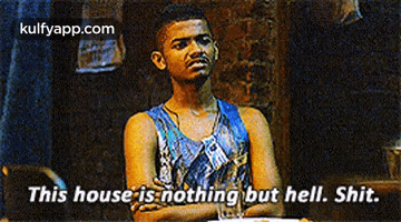 a man with his arms crossed says this house is nothing but hell shit .
