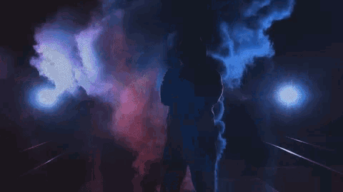 the word riot is being projected on a dark background .