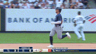 a baseball player is running on the field in front of a bank of america sign