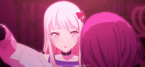 two anime girls are standing next to each other and looking at each other .