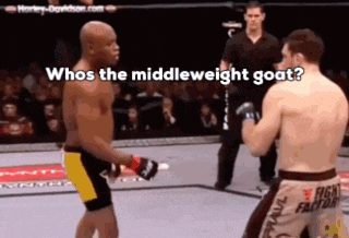 two men are fighting in a boxing ring with the words whos the middleweight goat on the bottom