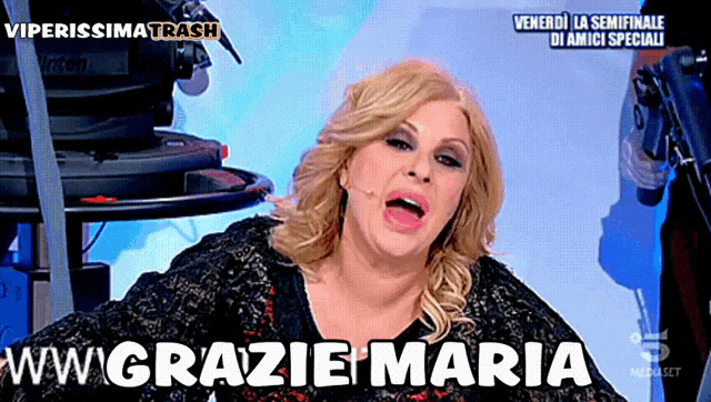 a woman on a tv show with the words ww grazie maria on the bottom