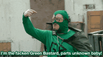 a man in a green superhero costume says i 'm the facken green bastard parts unknown baby