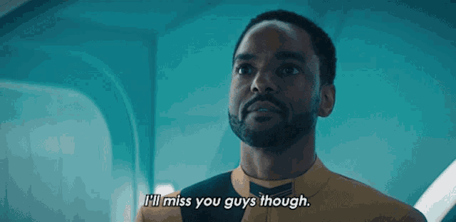 a man says " i 'll miss you guys though " in front of a blue background