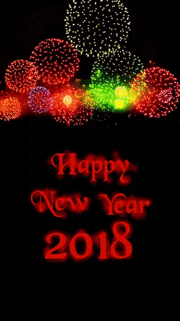 a happy new year greeting card with fireworks behind it