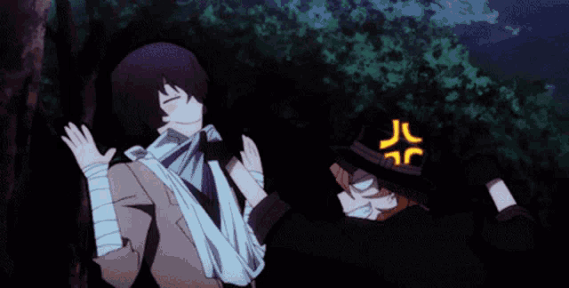 a man with a bandage on his arm is standing next to another man with a hat that has the letter j on it