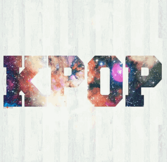 the word kpop is on a white background with a galaxy in the background