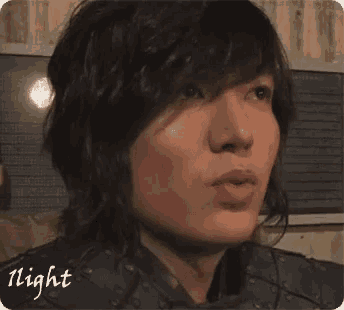 a close up of a person 's face with the word night written on the bottom