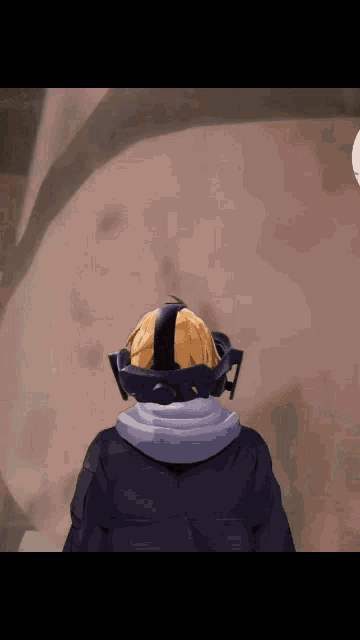 a person wearing a virtual reality headset is looking at something