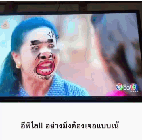 a tv screen shows a woman with her face painted in a cartoon style
