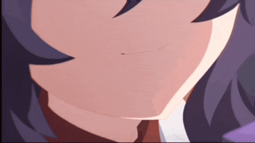 a close up of a person 's face with a purple hair