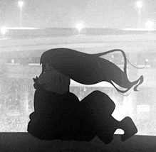 a black and white drawing of a woman with long hair laying down