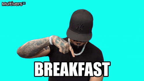 a man wearing a ny hat and a black shirt says breakfast