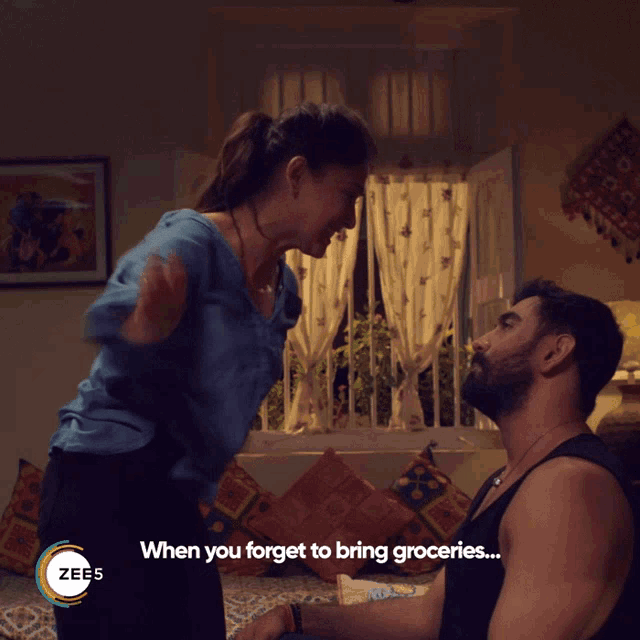 a poster for zee5 shows a man and a woman in a bedroom