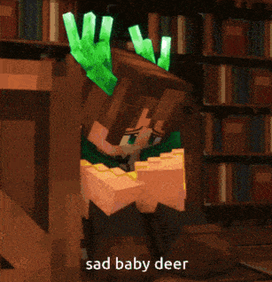 a sad baby deer is sitting in front of a library