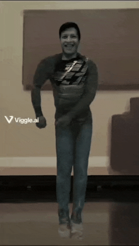 a man is dancing in front of a sign that says ' viggle.ai '