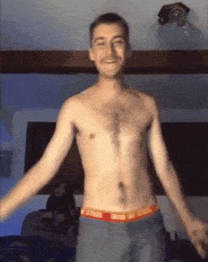 a shirtless man with a mustache is wearing a pair of underwear that says calvin klein