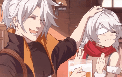 a man is petting a girl 's head while holding a glass