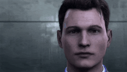 a close up of a man 's face with a blue circle in his forehead