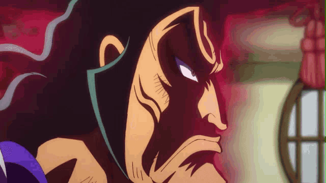 a close up of a cartoon character 's face with red eyes