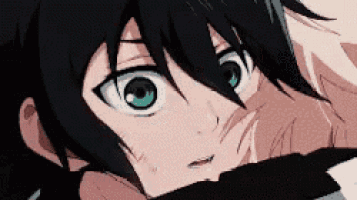 a close up of a person 's face with a black hair and green eyes .