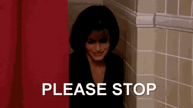 a woman behind a red curtain with the words please stop written on it