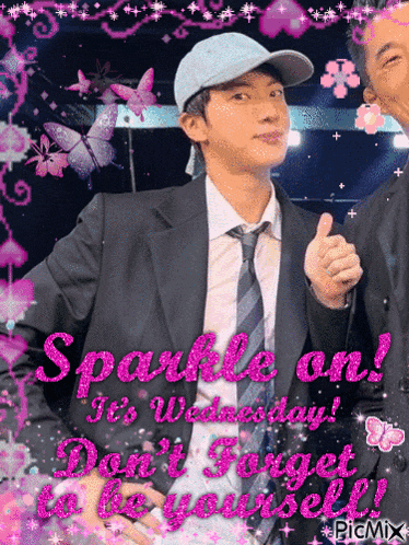 a man in a suit and tie gives a thumbs up with the words sparkle on it 's wednesday