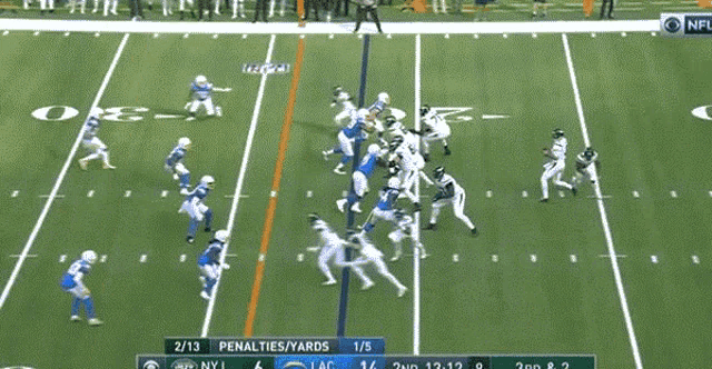 a football game is being played between the ny jets and the washington redskins
