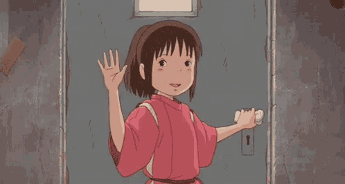 a girl in a pink kimono is standing in front of a door and waving .