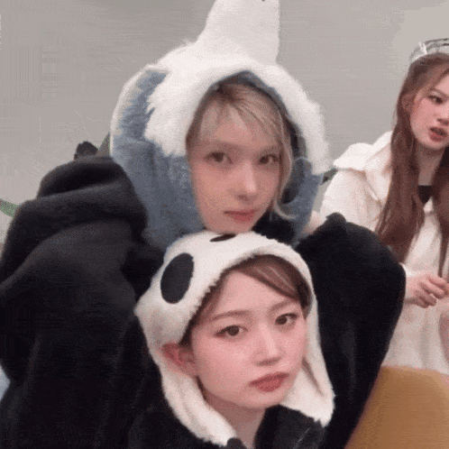 a girl with a panda hat on her head