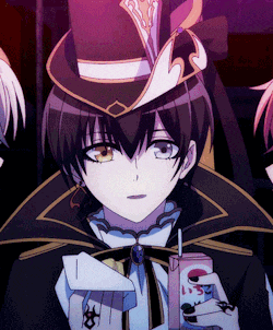 a boy in a top hat holds a box of pepsi