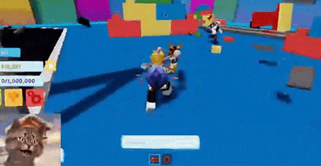 a group of people are playing a video game in a room filled with lots of colorful blocks .