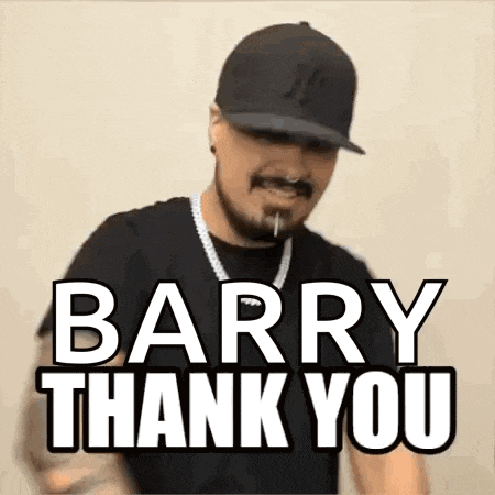 a man wearing a hat and a necklace is giving a thank you gesture .