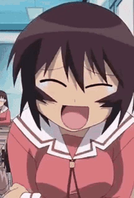 a girl in a red shirt is laughing with her mouth open