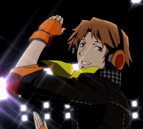 a man wearing headphones is smiling and holding a light