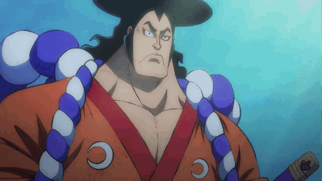 a cartoon character with a red shirt and blue beads has a crescent moon on his chest