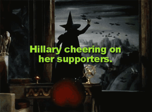 a picture of a witch with the words hillary cheering on her supporters behind her