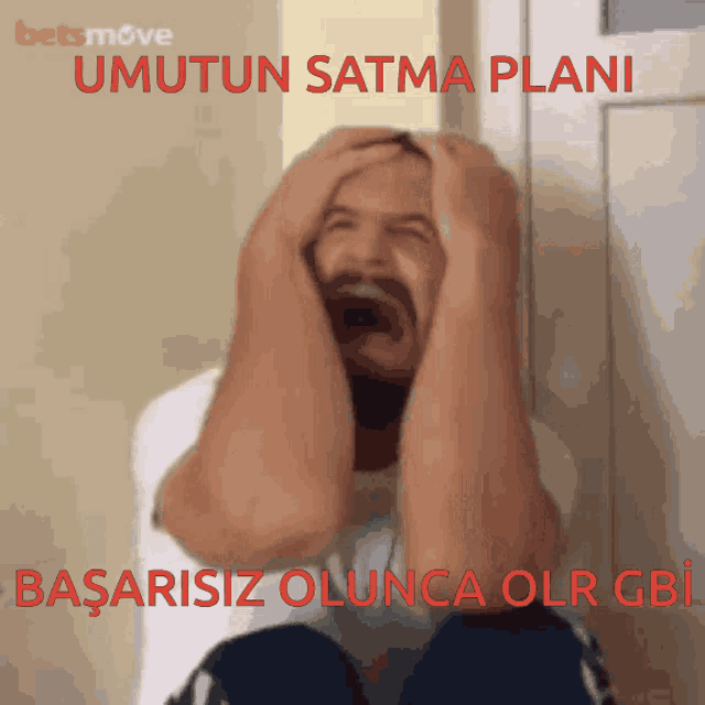 a man covering his face with his hands with the words umutun satma plani written on the bottom
