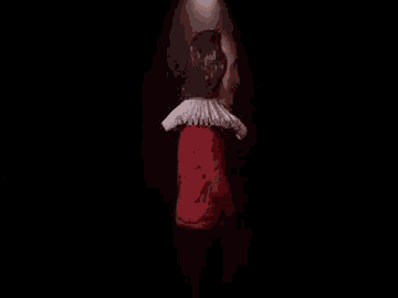 a puppet of shakespeare is dancing on a stage .