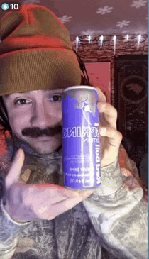 a man with a mustache is holding a purple can that says ' iced tea ' on it