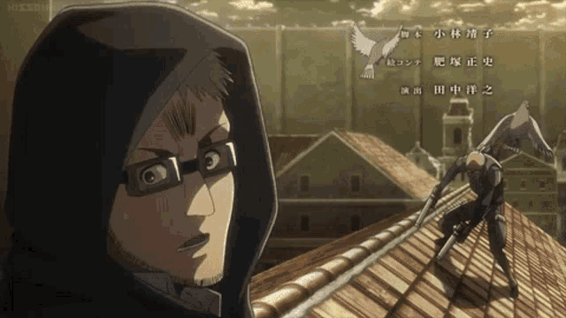 a man in a hooded jacket stands on a roof with a bird in the background