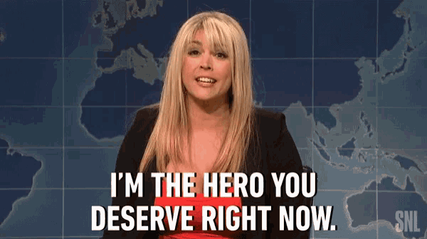 a woman is standing in front of a map and says `` i 'm the hero you deserve right now '' .