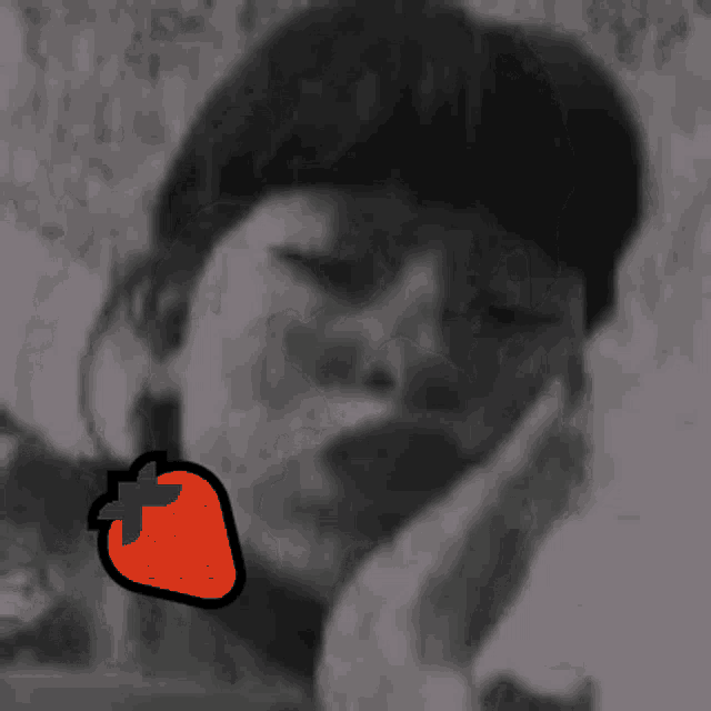 a drawing of a man with a strawberry on his face
