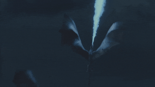 a person in a dark room with a smoke coming out of their mouth