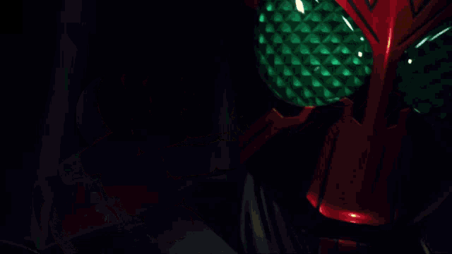 a close up of a person 's face with a green eye