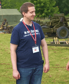 a man wearing a t-shirt that says in my defence