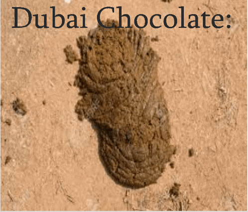 a pile of dirt with the words " dubai chocolate " above it