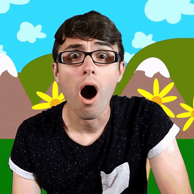 a man wearing glasses and a black shirt looks surprised with his mouth open